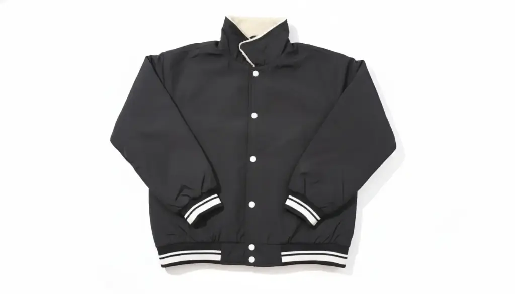 Varsity Warmth: Black Bomber with Cozy Sherpa Collar